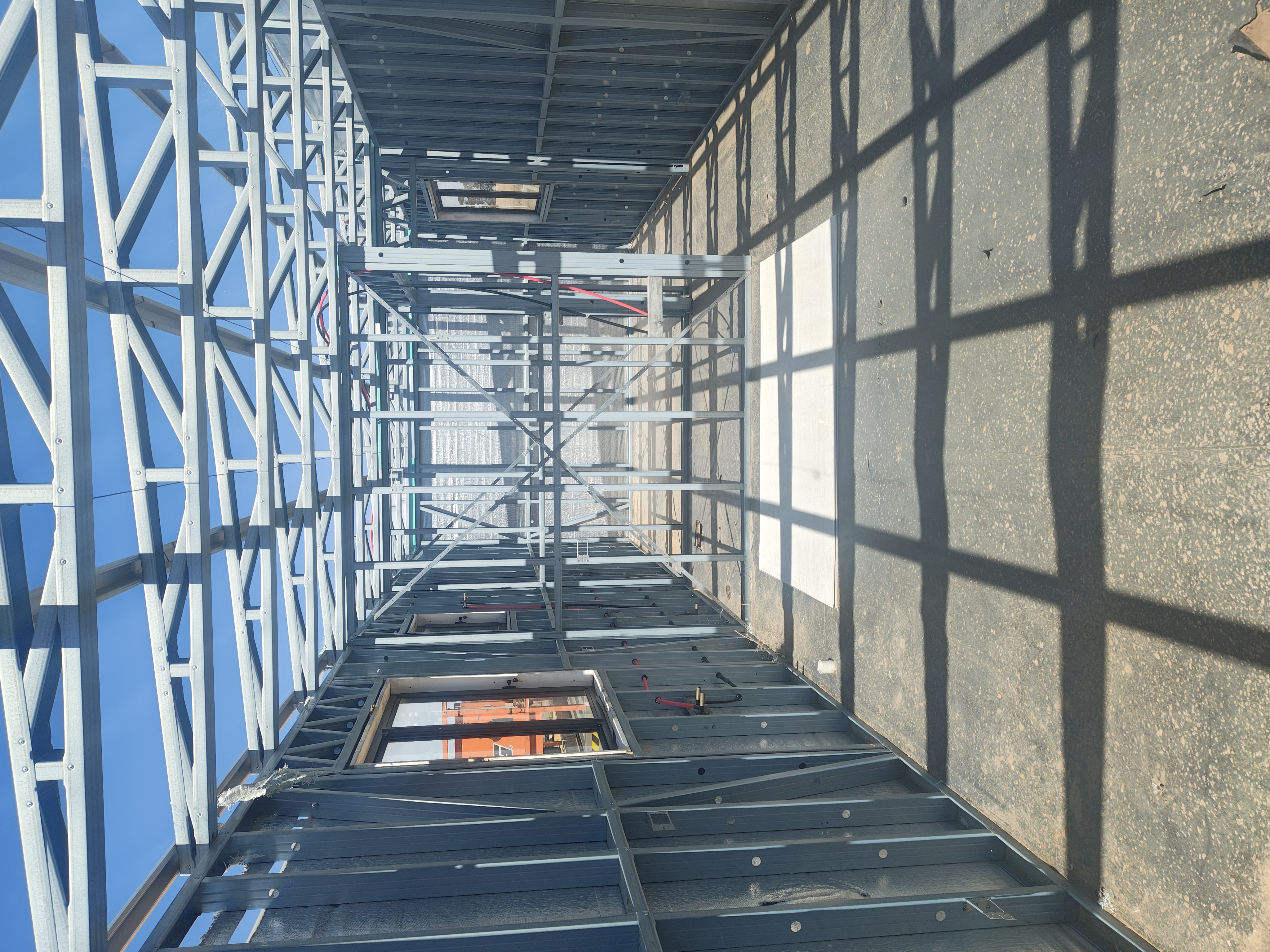 Interior view looking up through NW Steel Frames modular structure